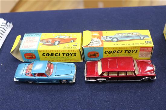 Eight boxed Corgi cars and a Marx remote controlled car